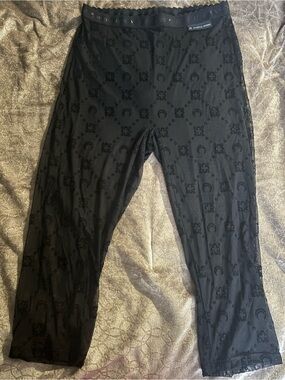 Marine Serre Black Crescent-Pattern Mesh pants